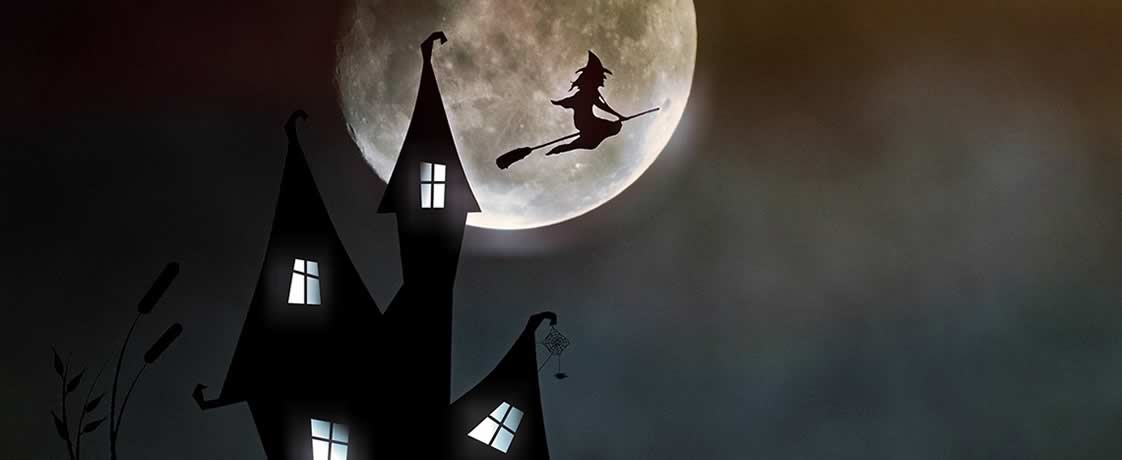 Bild einer fliegenden Hexe und eines Geisterhauses